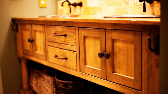 Wooden cabinet with drawers and doors in a bathroom sink setting