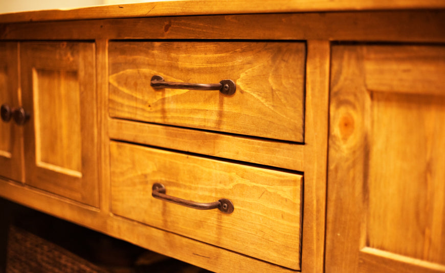 Rustic wooden cabinet with two drawers and metal handles